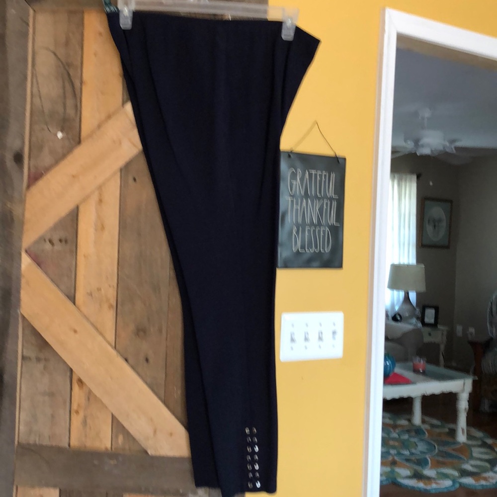 navy blue straight leg  grommets bottom of pants
